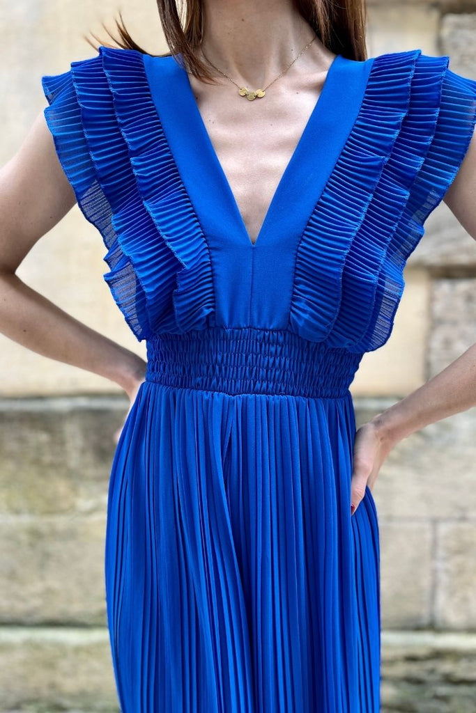 Combinaison Jeanne, couleur bleu électrique, taille élastique, encolure V devant et dans le dos, pantalon plissé, taille unique
